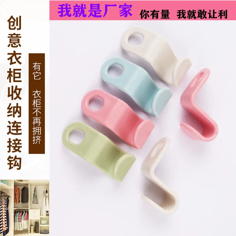 Plastic single hook hanger made of ABS material for wardrobe organization and garment drying; lightweight stackable design suppo