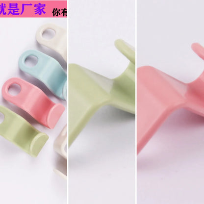 Plastic single hook hanger made of ABS material for wardrobe organization and garment drying; lightweight stackable design suppo